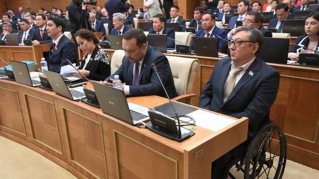 Lawmakers seated in the Kazakh parliament in Astana, Kazakhstan, 23 March 2023.