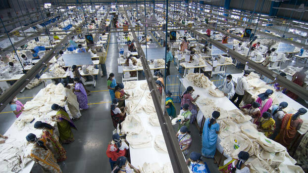 Workers on a production line in a textile factory.