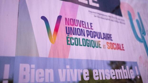 A campaign poster for the Nouvelle Union Populaire Ecologique et Sociale (NUPES) during the 2022 French parliamentary elections.